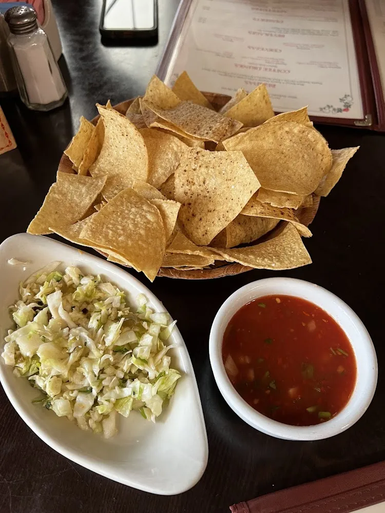 Complimentary Chips Salsa and Cabbage Slaw